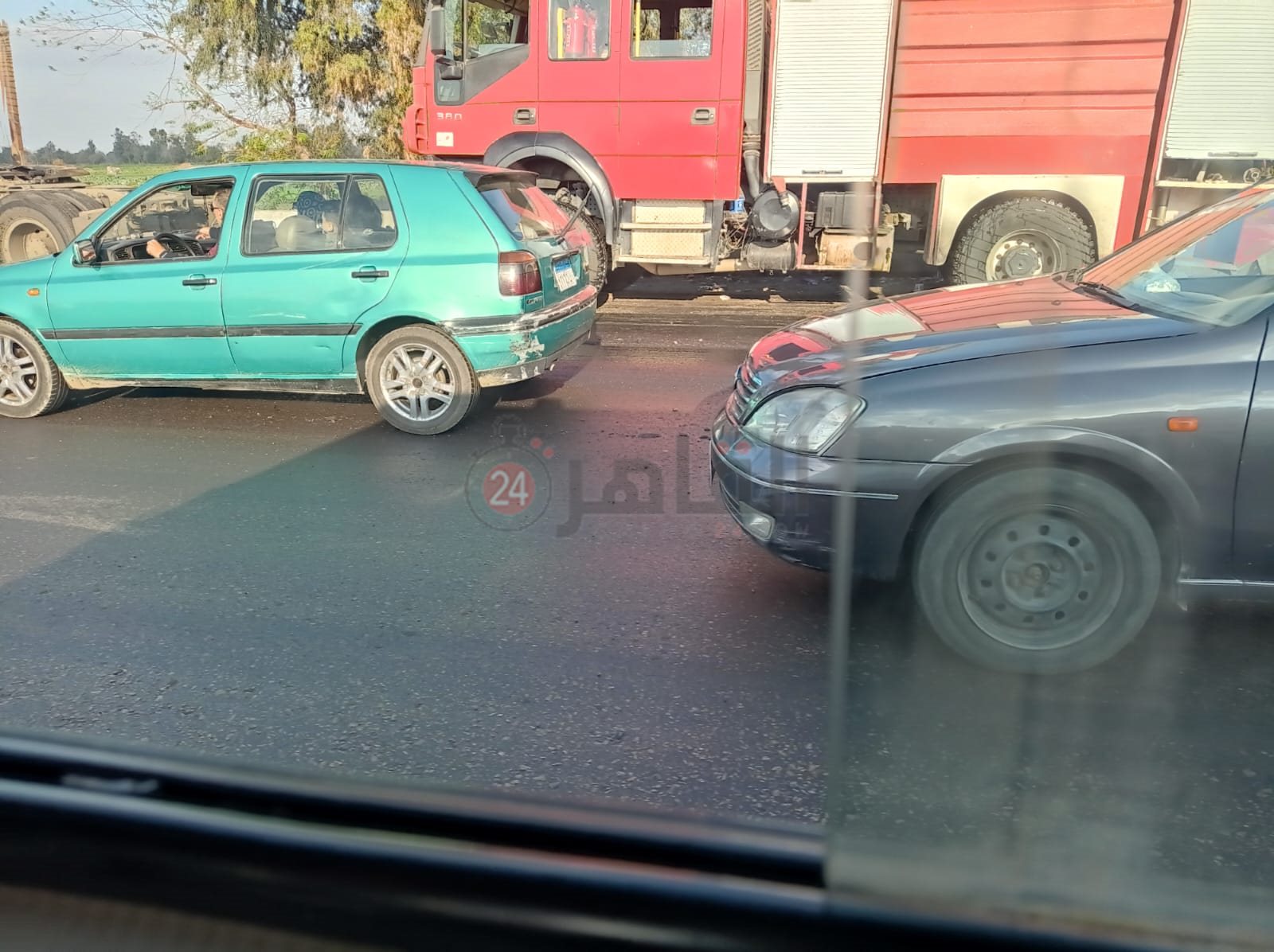 انقلاب سيارة محملة بالزيت أعلى طريق مصر - إسكندرية الزراعي