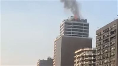 السيطرة على حريق في برج نهضة مصر بالمهندسين| صور 