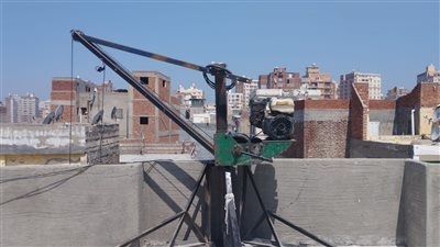 حي وسط بالإسكندرية يوقف أعمال مخالفة ويتحفظ على ونش وسيارة محملة بمواد البناء
