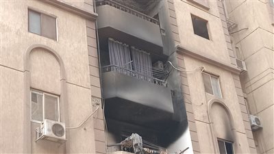 بسبب شاحن موبيل.. تفاصيل حريق شقة سكنية في فيصل (صور)