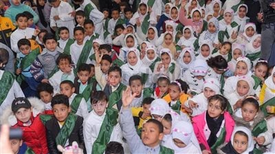 وشاح أخضر وزي موحد.. قرية بالغربية تحتفل بـ120 طفلا من حفظة القرآن الكريم 
