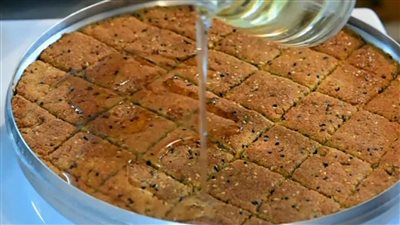 خطوة بخطوة طريقة عمل صينية الحلبة الفلسطينية